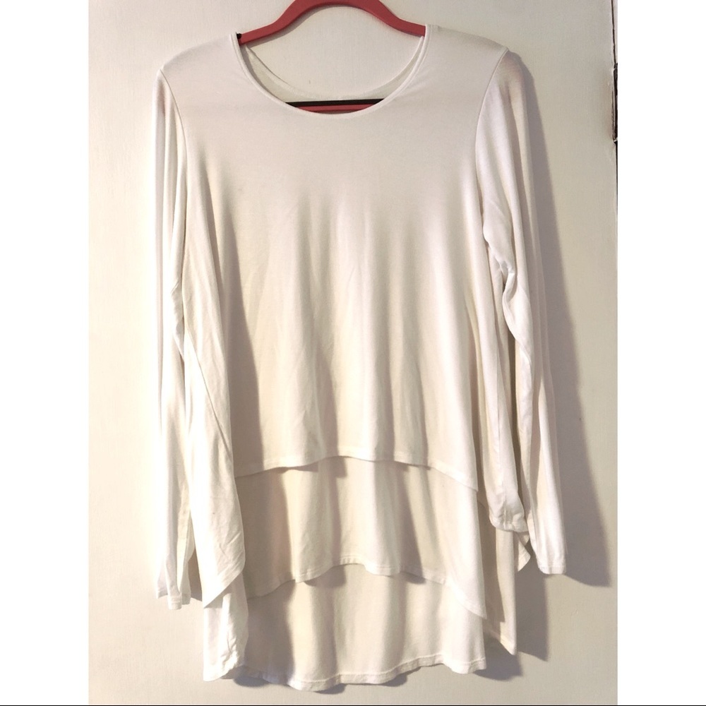 Layered white soft surrounds top